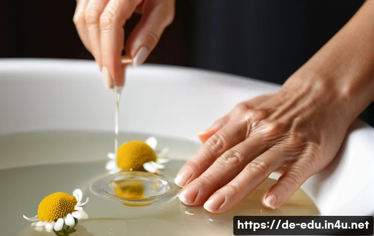 시니어 네일 아트 - A close-up of mature female hands with naturally shaped nails gently soaking in a warm hand bath inf...